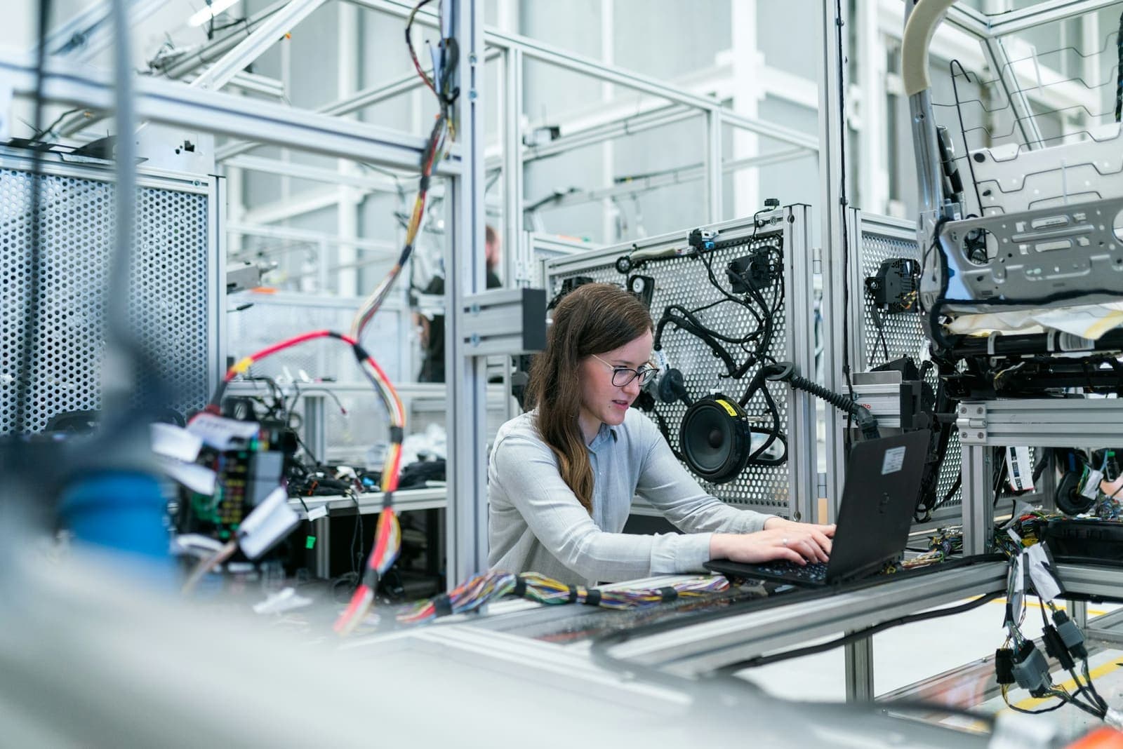 Engineer working on a laptop in a lab